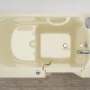 Universal Collection 26 in. L x 46 in. W Right Side Drain Air Jetted Bathtub in Biscuit with Fast Filling Faucet Set
